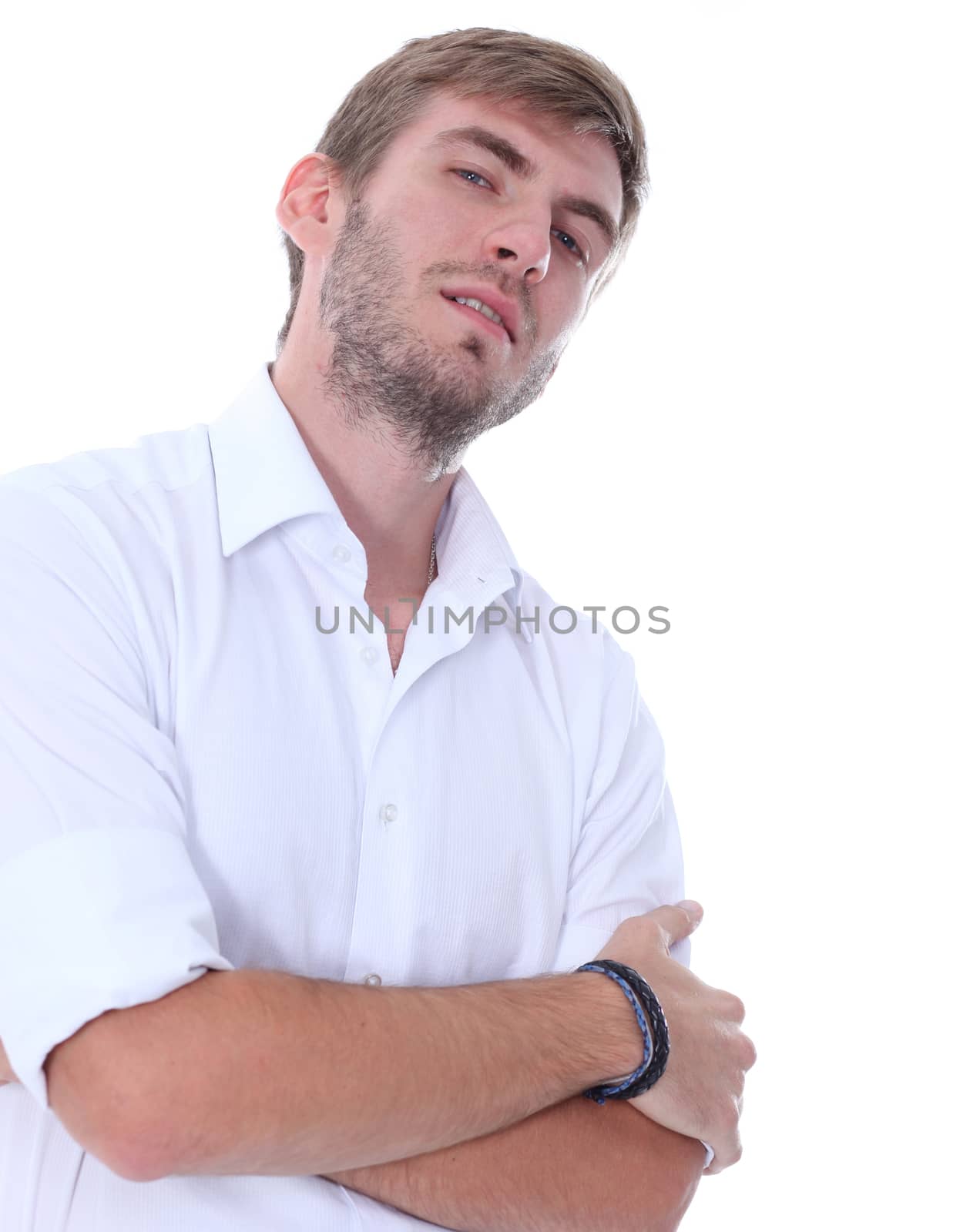 Portrait of a young man standing against white background