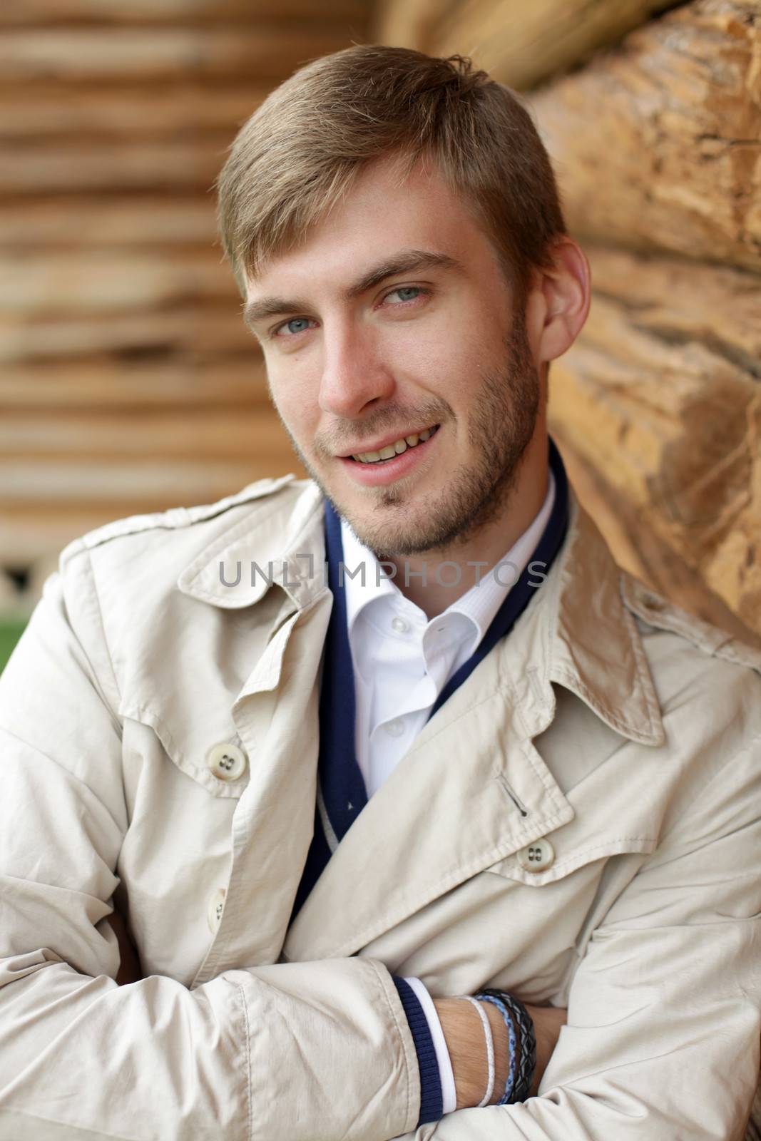 Portrait of young attractive man, outdoors