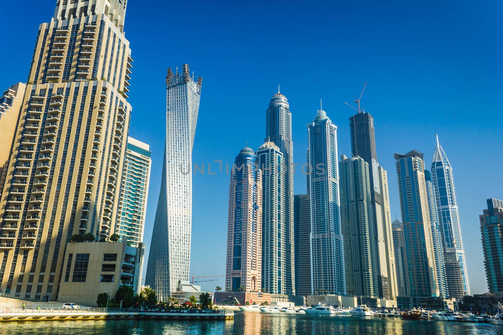  High rise buildings and streets in Dubai, UAE by oleg_zhukov