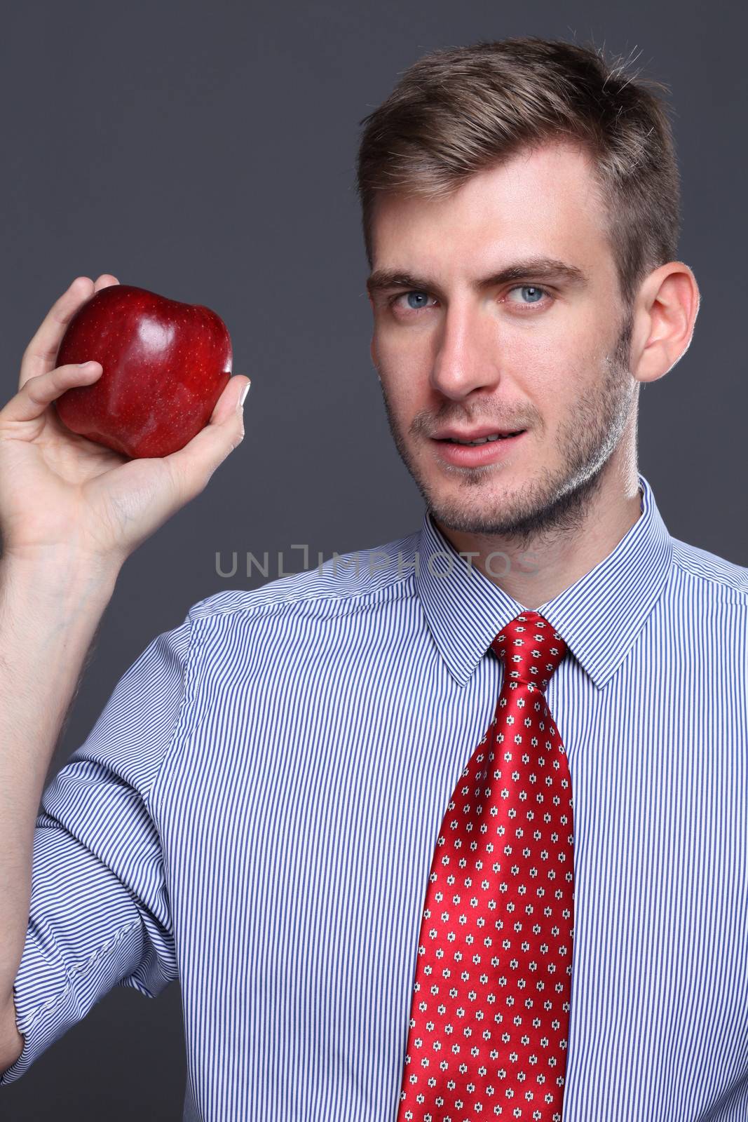 Portrait of young business man by andersonrise