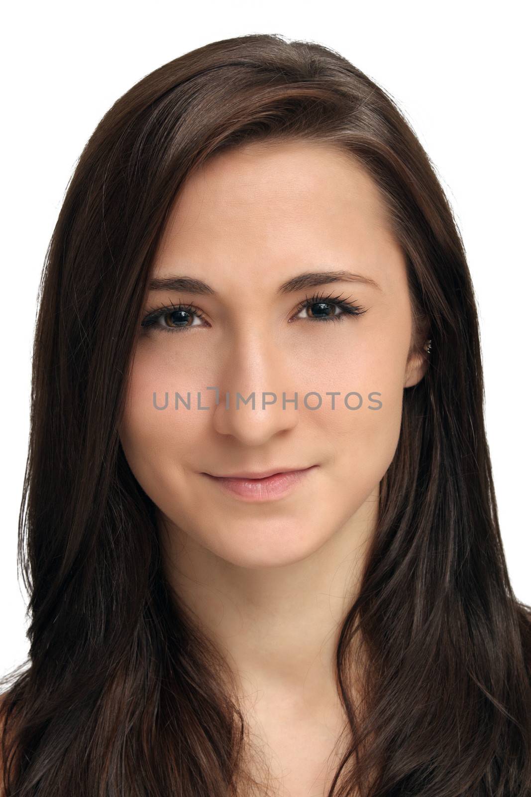 A studio close-up of a lovely young brunette.