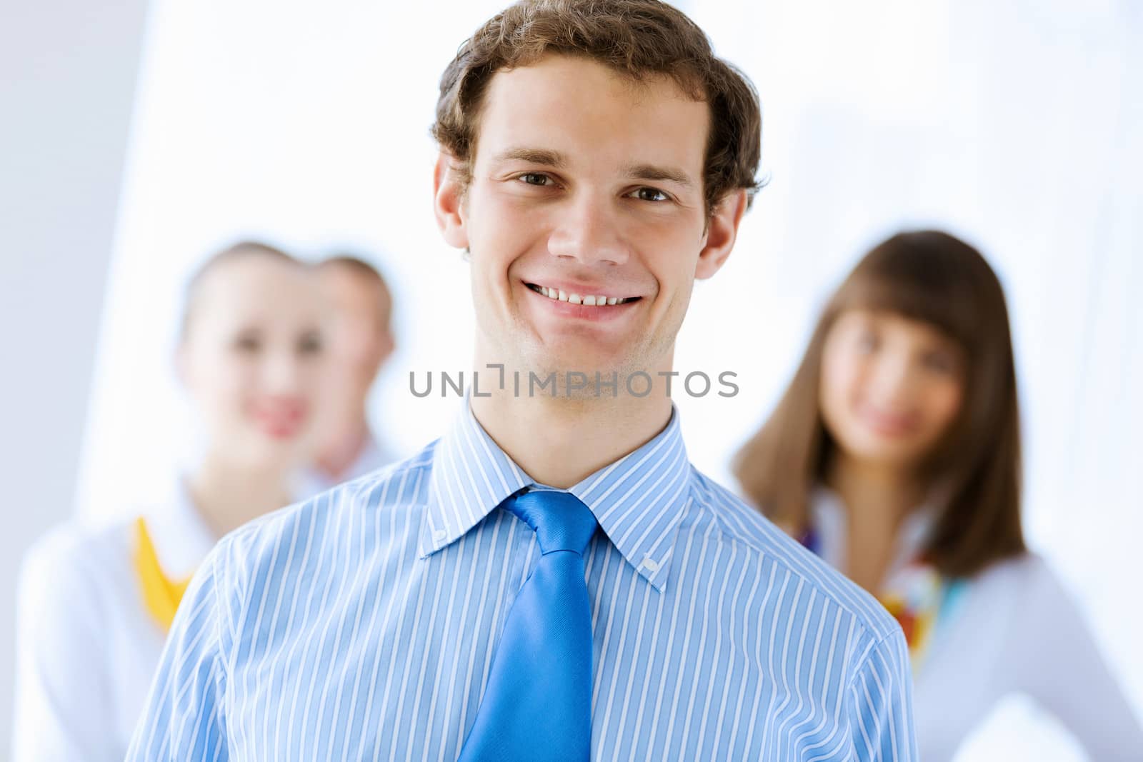 Image of successful young happy business persons