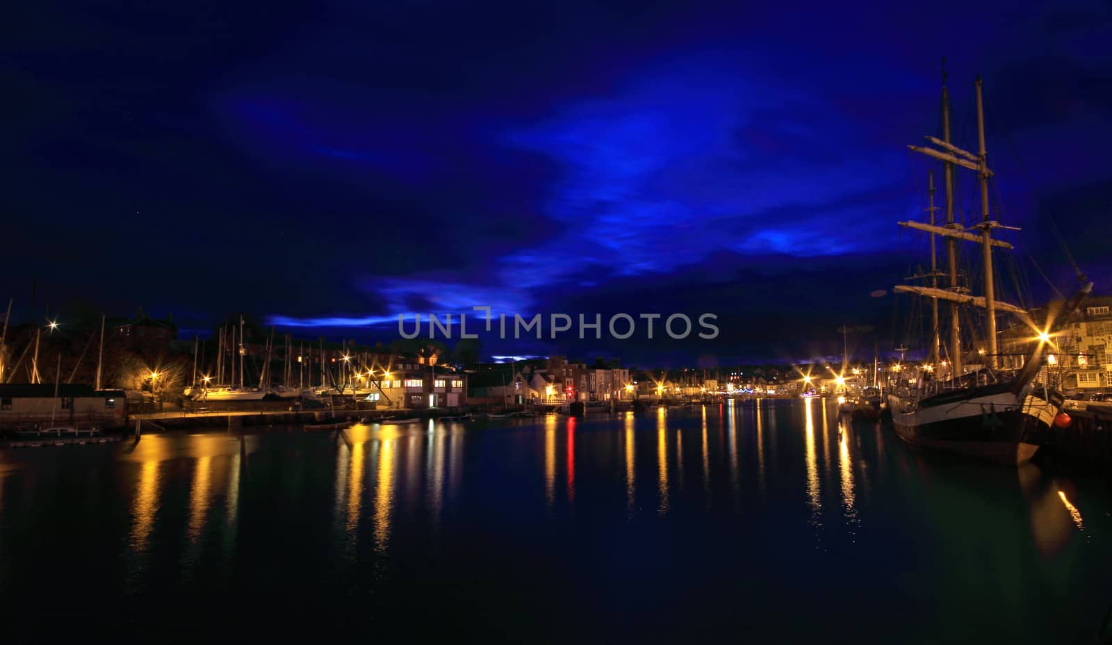 Weymouth harbour at sunset by olliemt