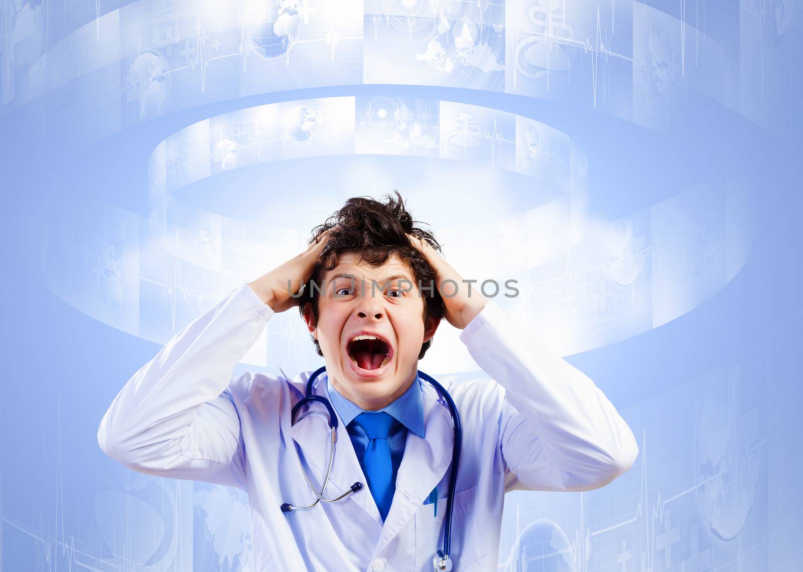 Image of young male doctor screaming in madness