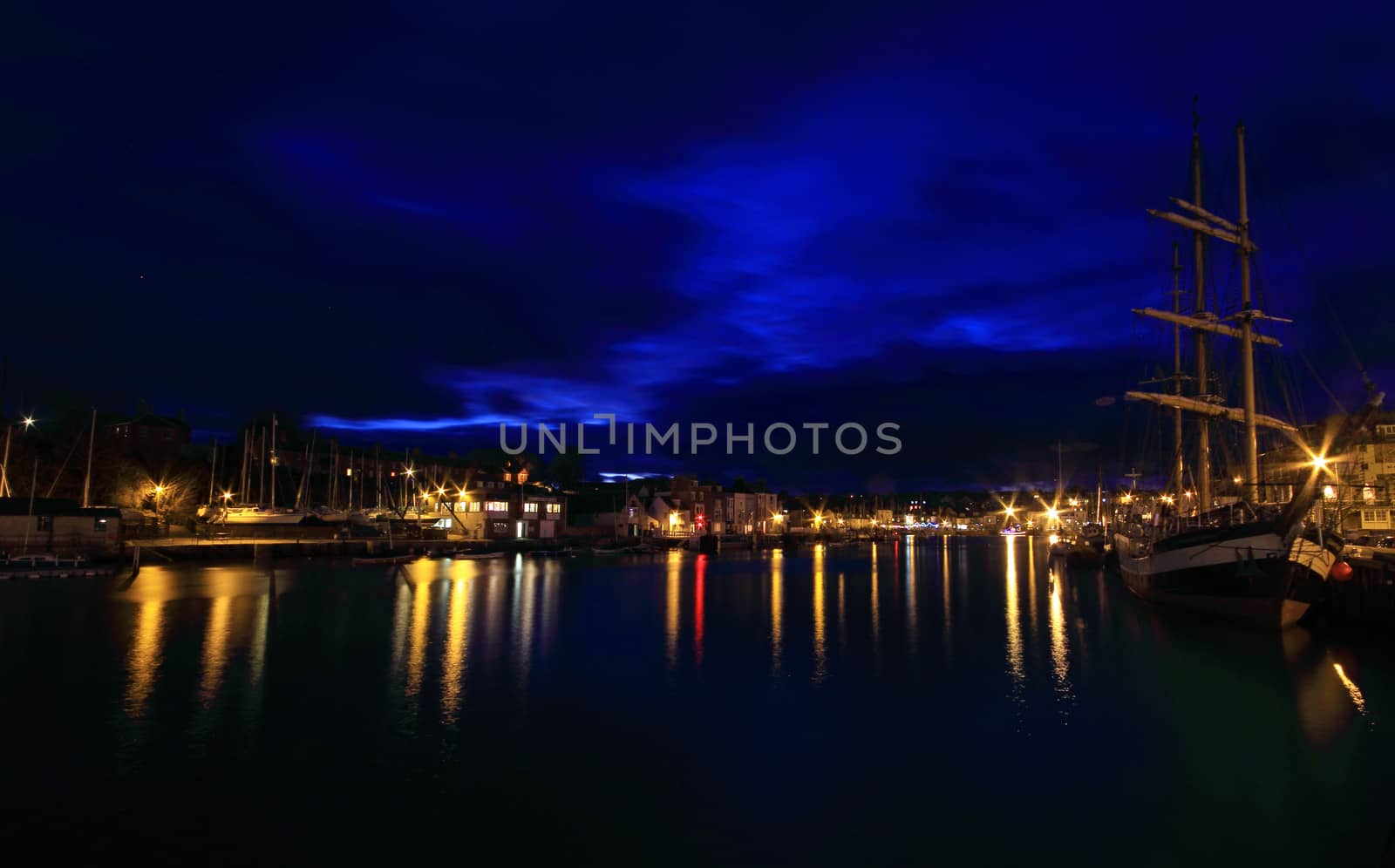 Weymouth harbour at sunset by olliemt