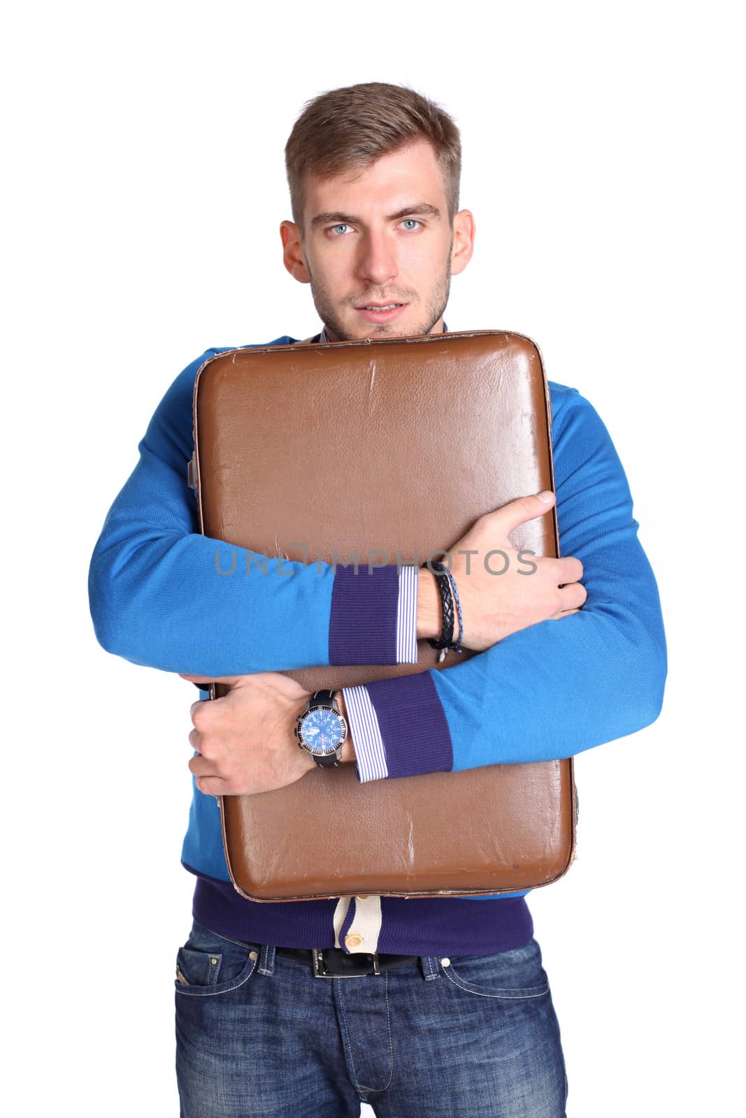 A young man carrying a suitcase by andersonrise