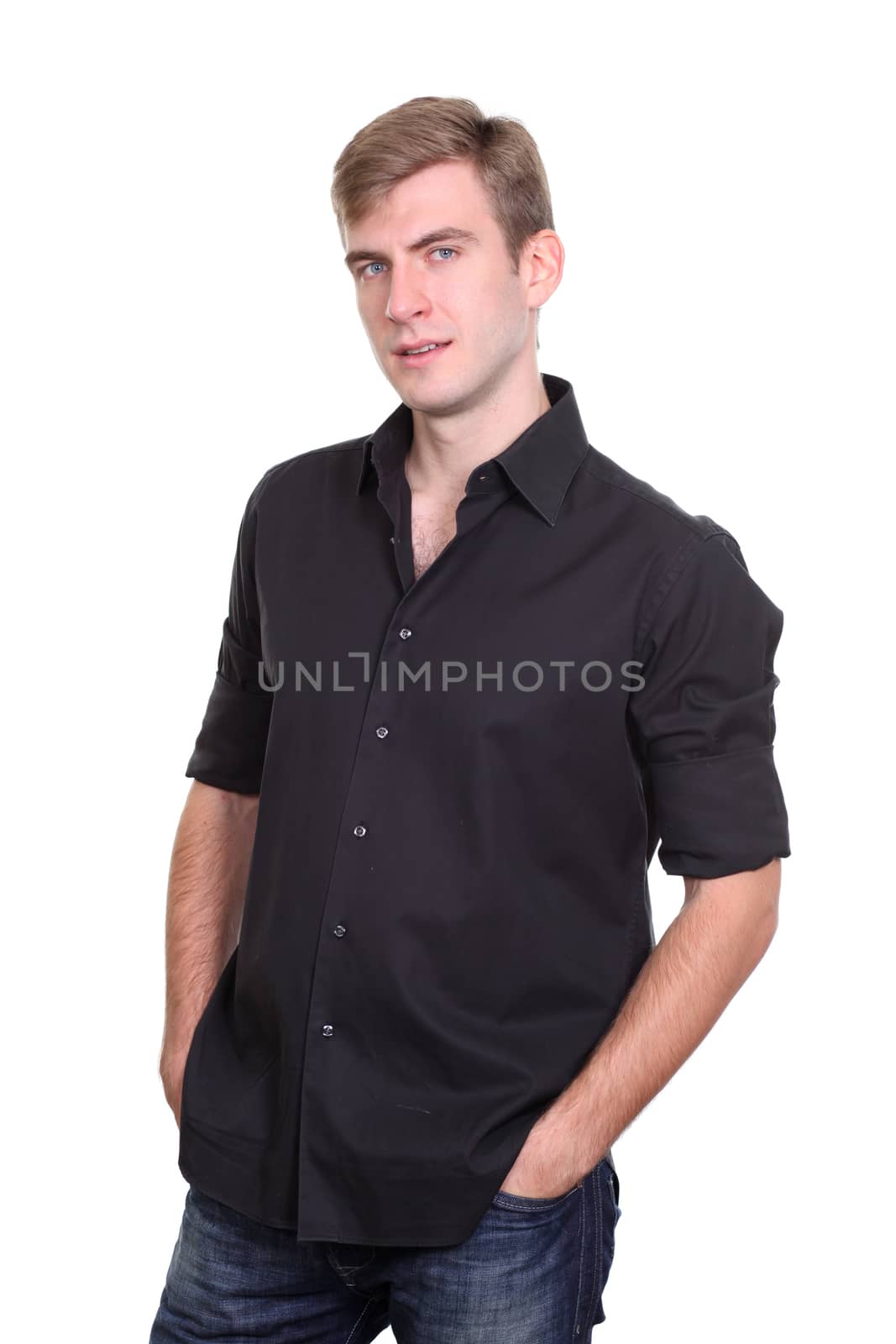 Portrait of a young man standing against white background