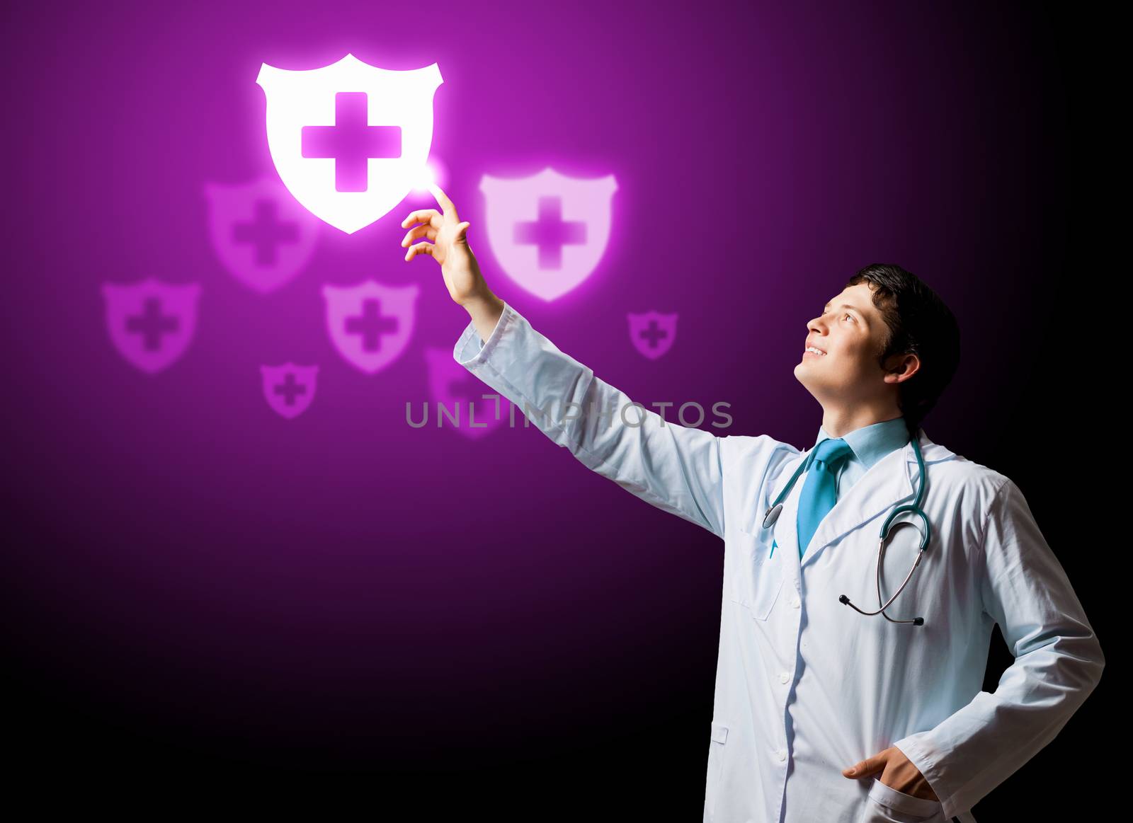 Young doctor touching with finger media medical sign