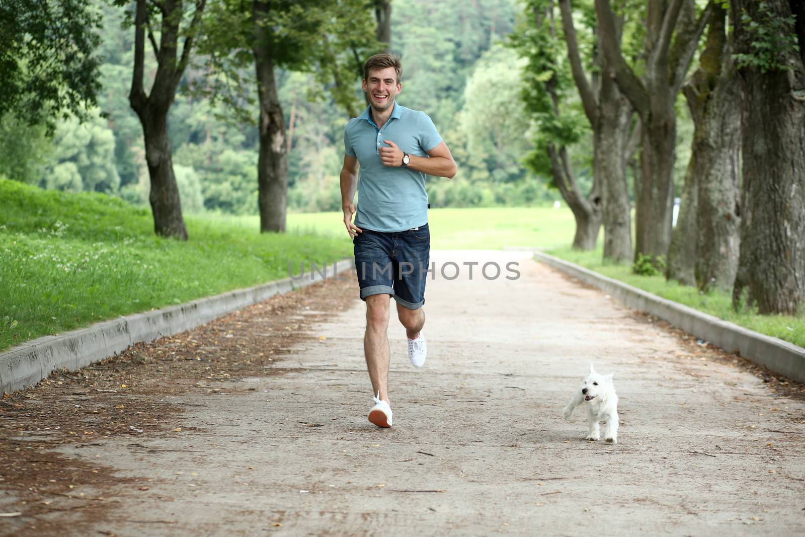 Young man running with your dog