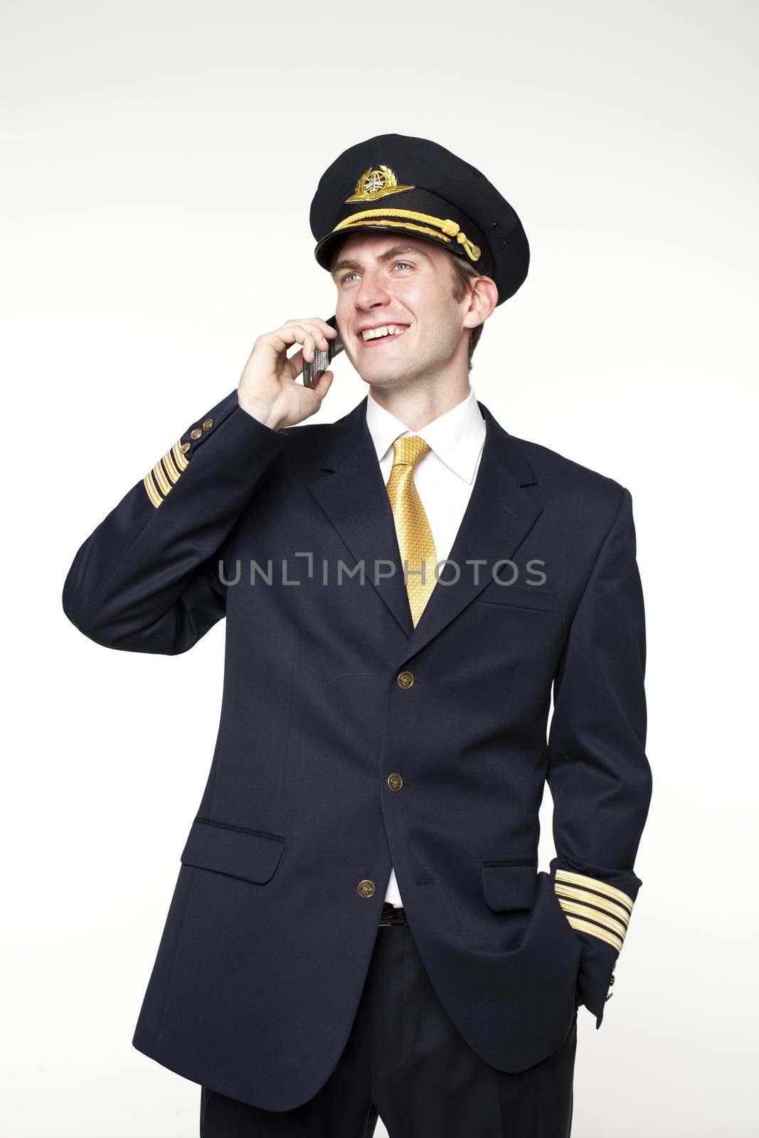 Young man in the form of a passenger plane pilot by andersonrise