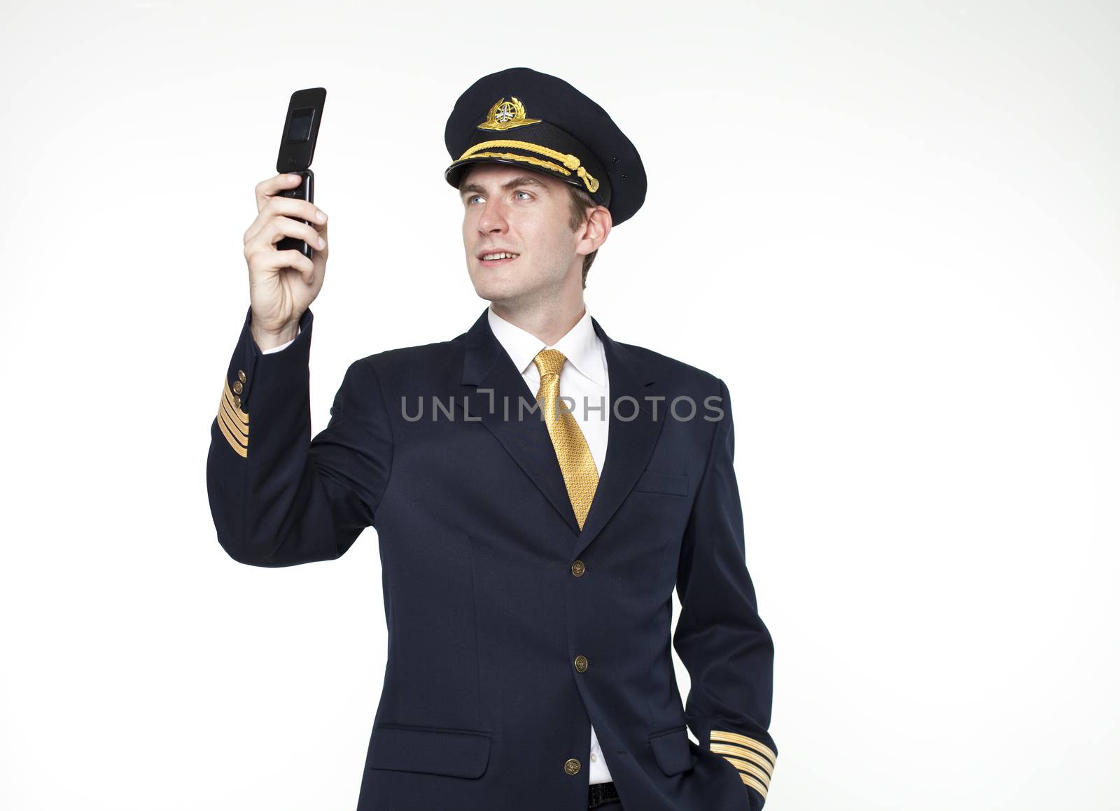 Portrait of a young man in the form of a passenger plane pilot