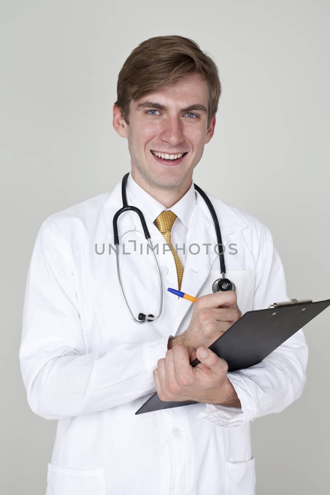 Studio portrait of a confident young doctor by andersonrise