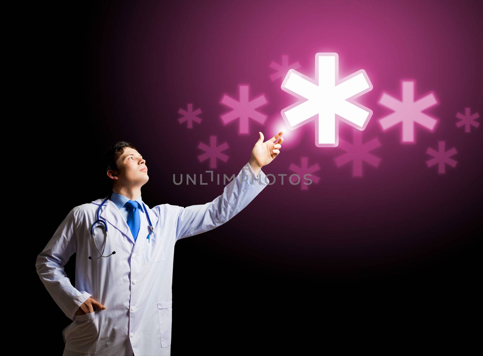 Young doctor touching with finger media medical sign