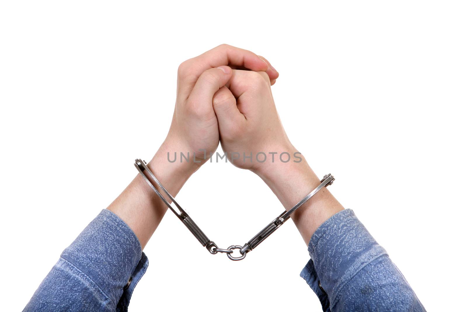 Handcuffs on Hands closeup Isolated on the White Background