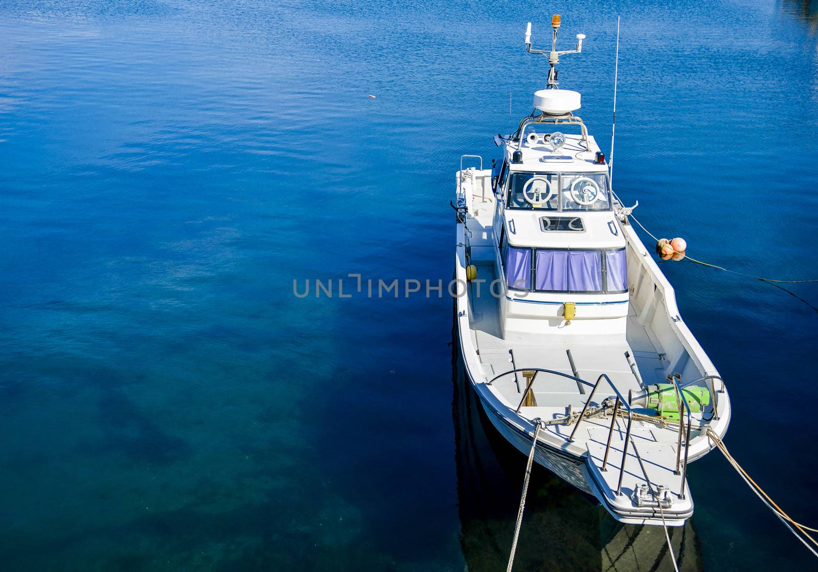 Speed boat on port