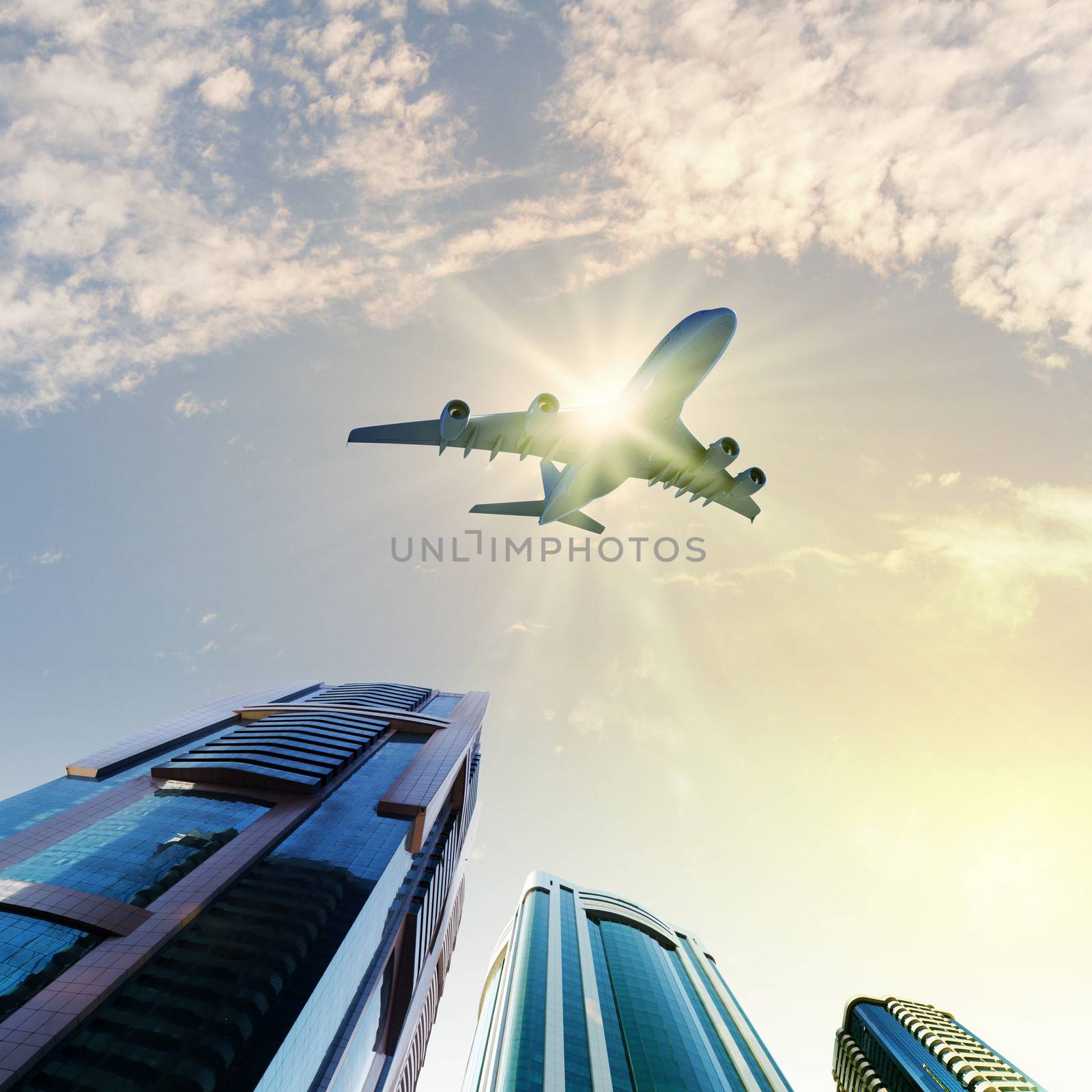 Image of airplane flying above skyscrapers. Bottom view