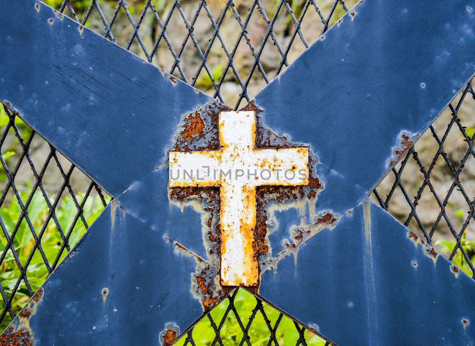 Rusty cross on steel by gjeerawut