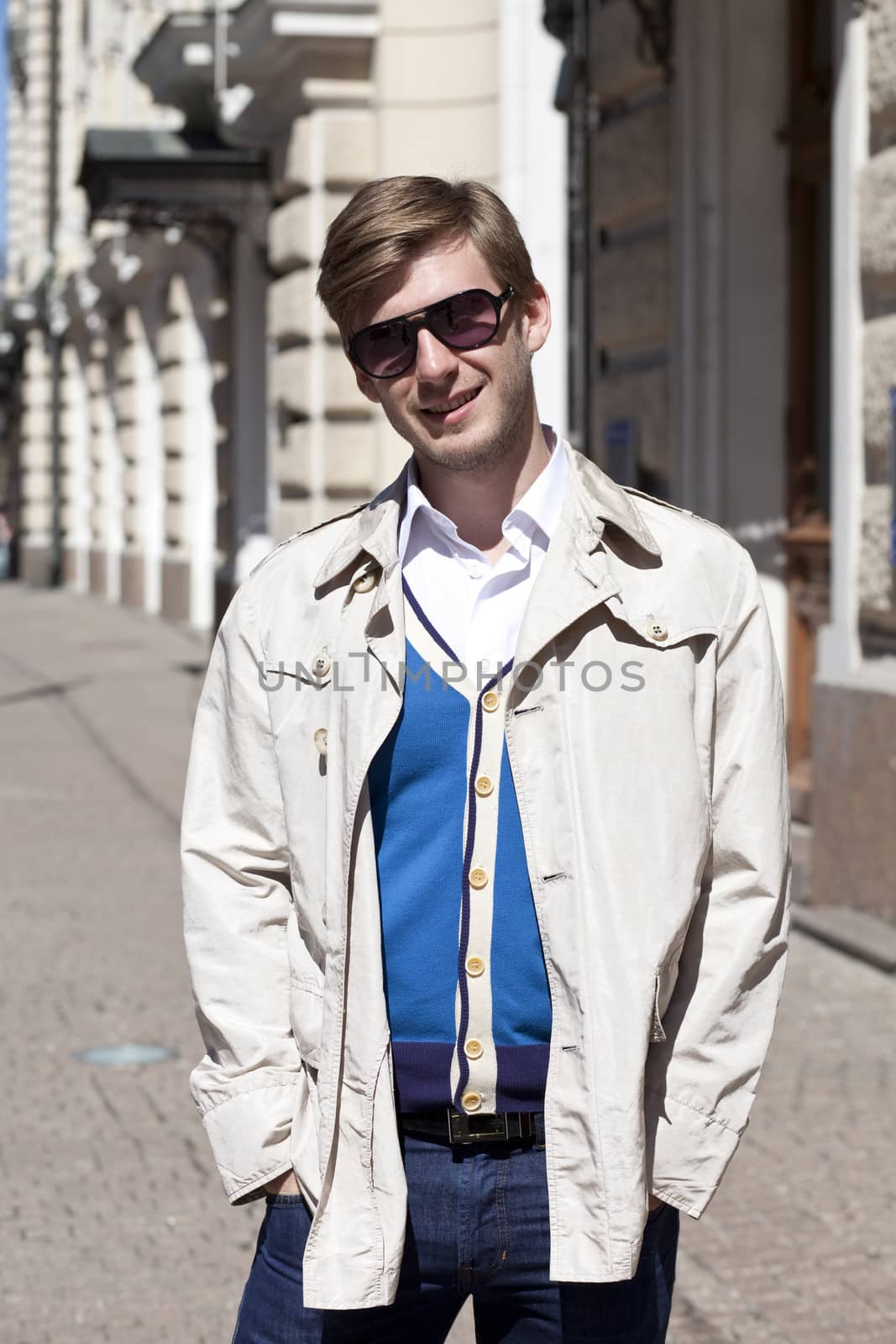 Portrait of young attractive man, outdoors