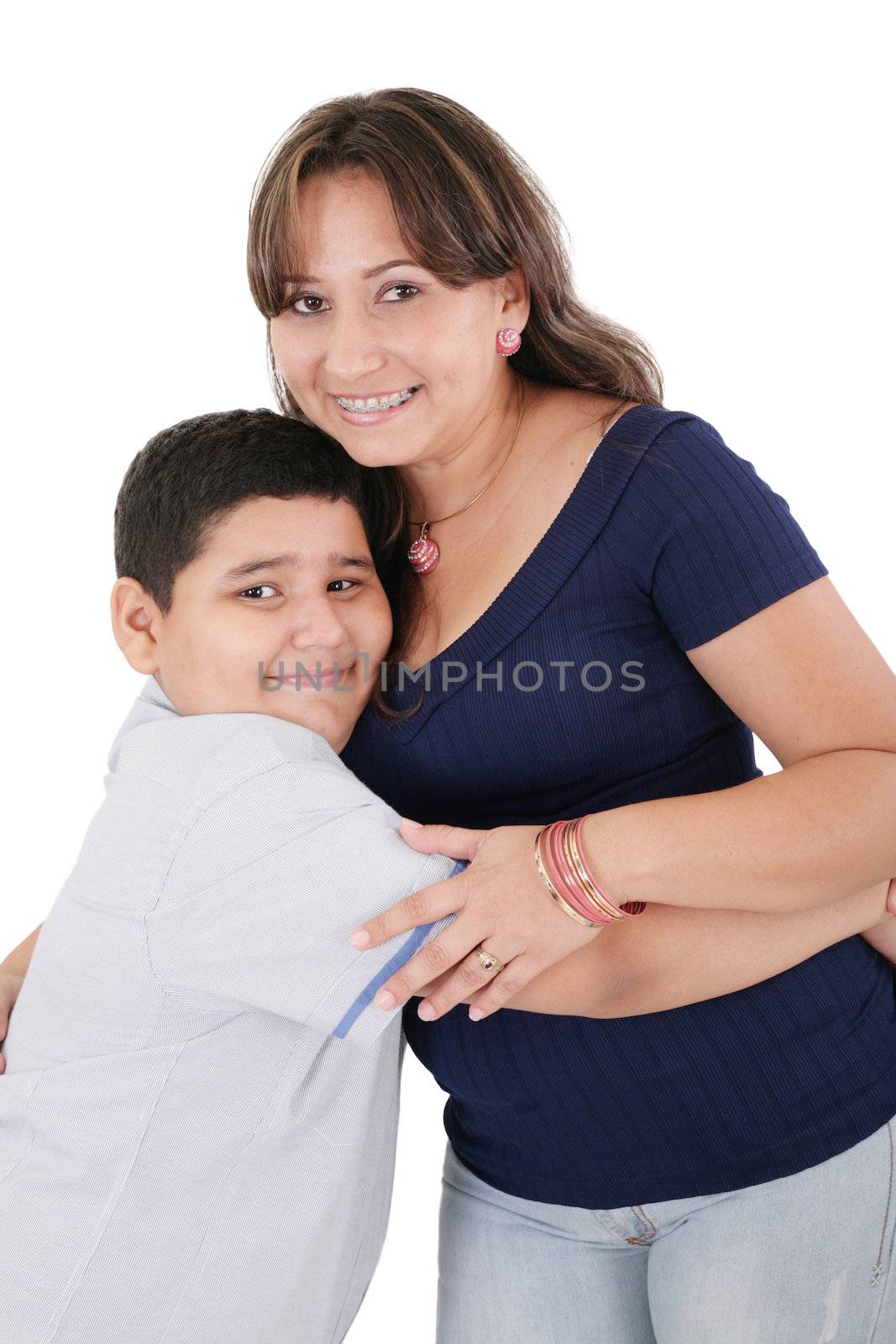 Happy young mother and her son posing together. Isolated over white.