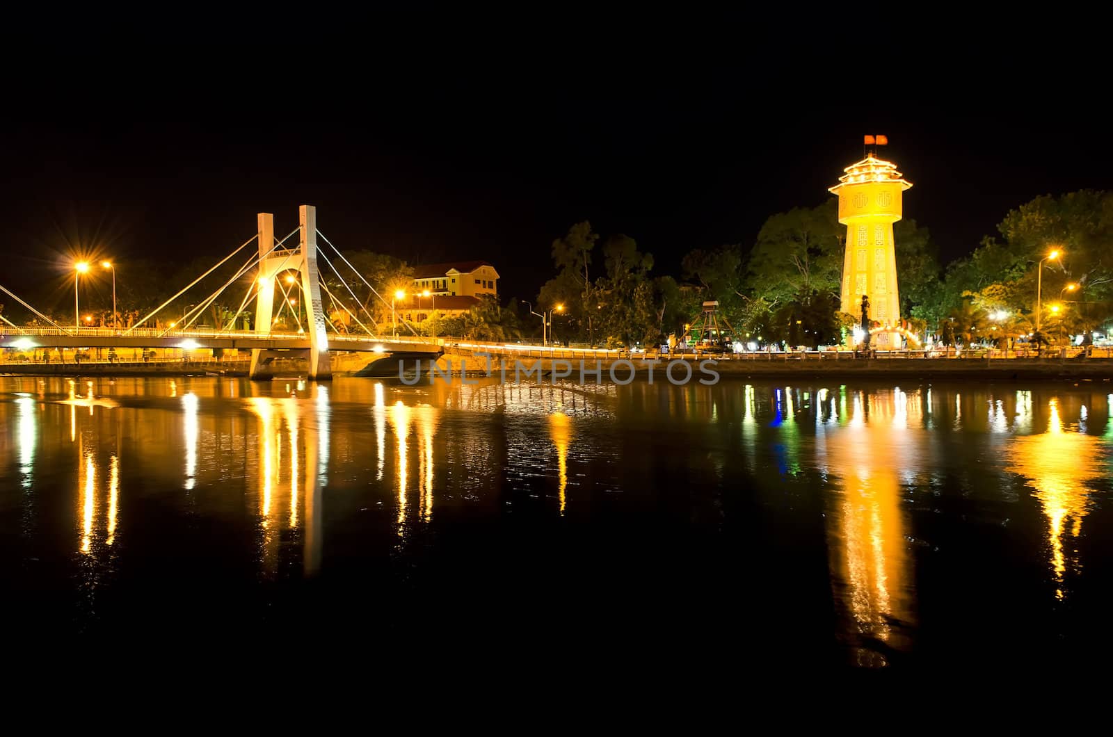 Phan Thiet Water Tower on Ca Ty River at Night. by GNNick