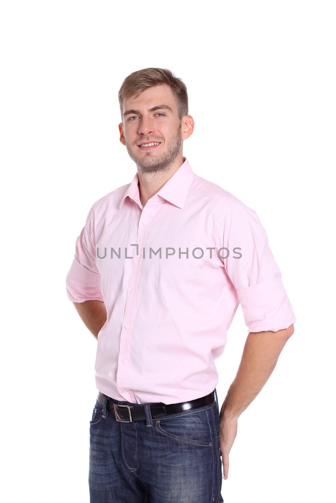 Portrait of a young man standing against white background