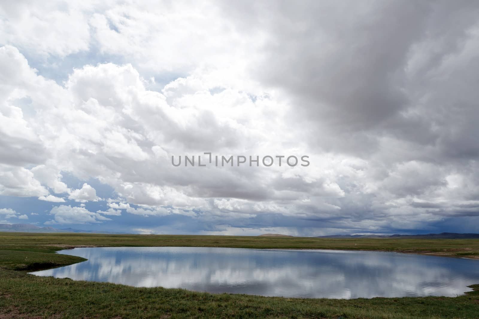 Landscape of lake and clouds in Tibet in the summer