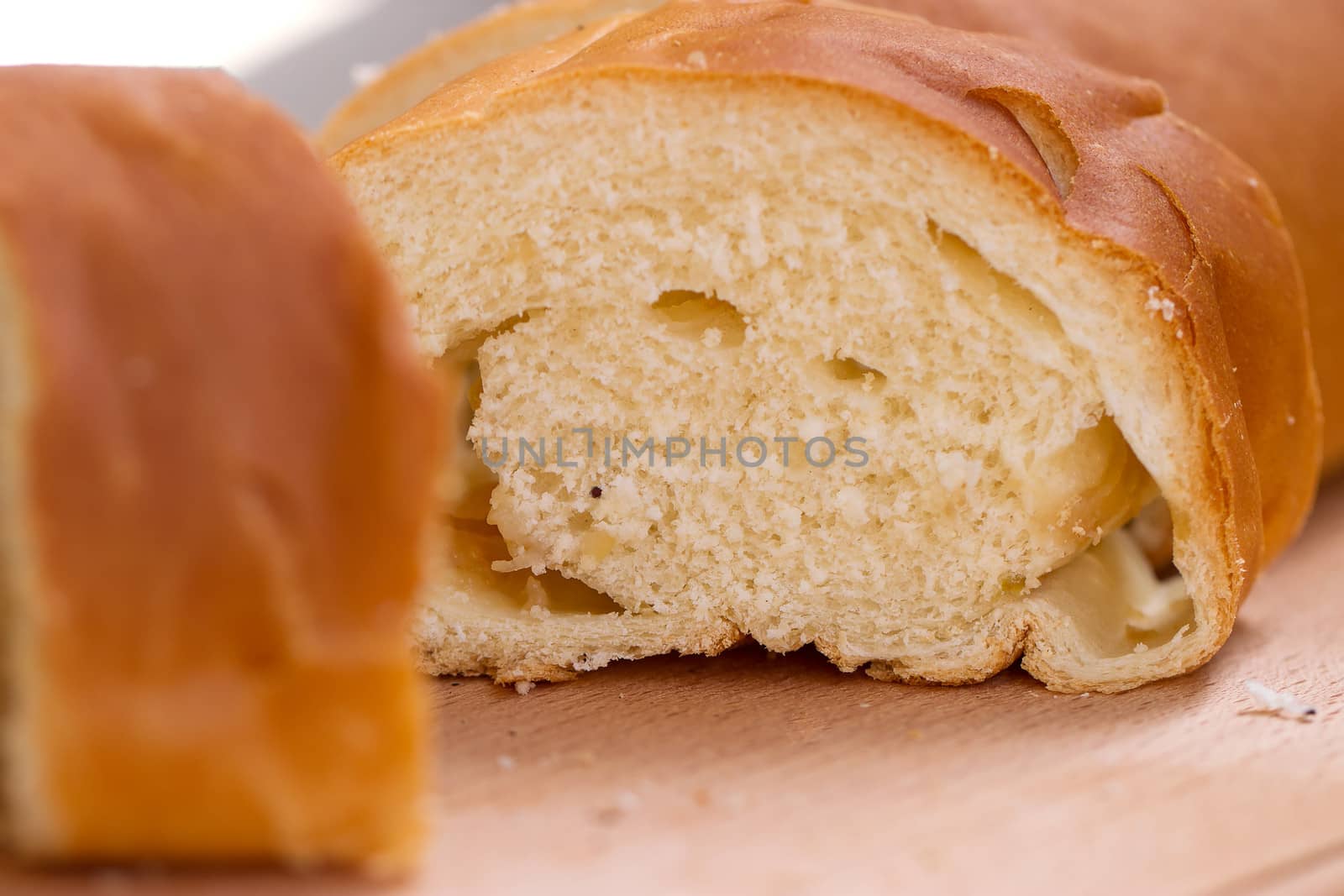 White bread loaf sliced ������on the board