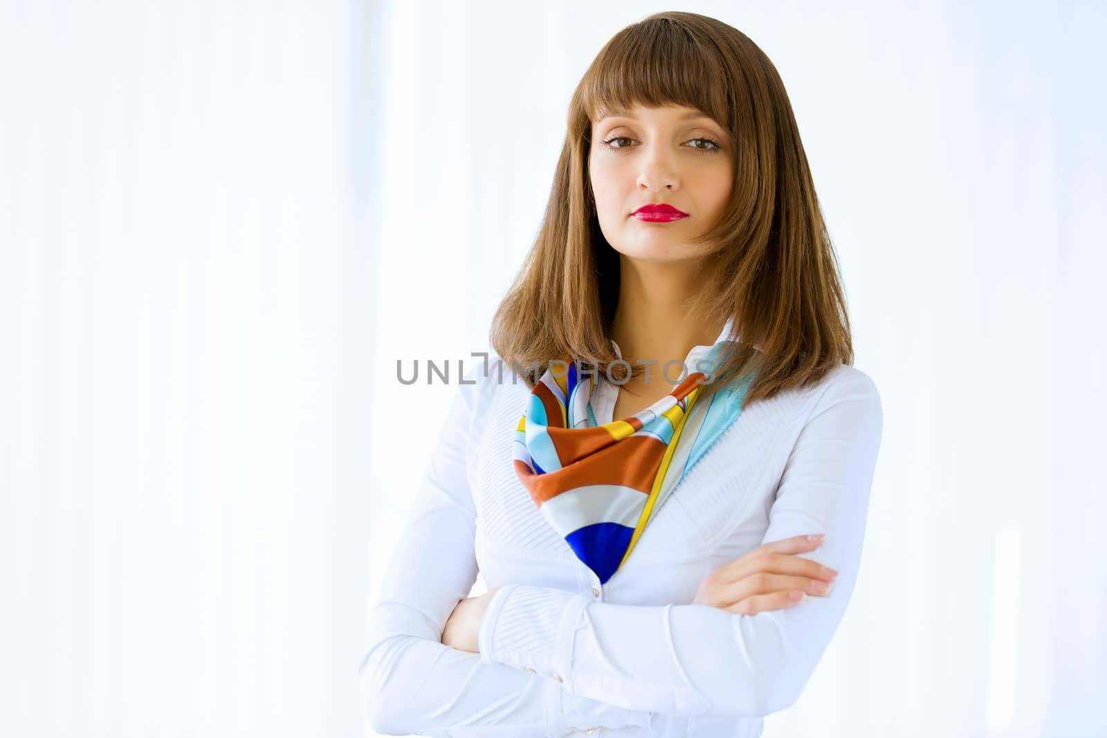 Image of attractive successful businesswoman in business suit smiling