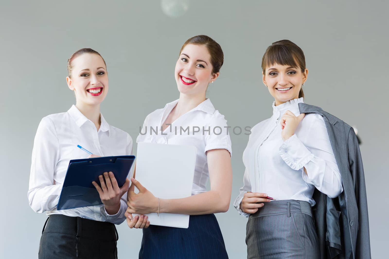 Three young businesswomen by sergey_nivens