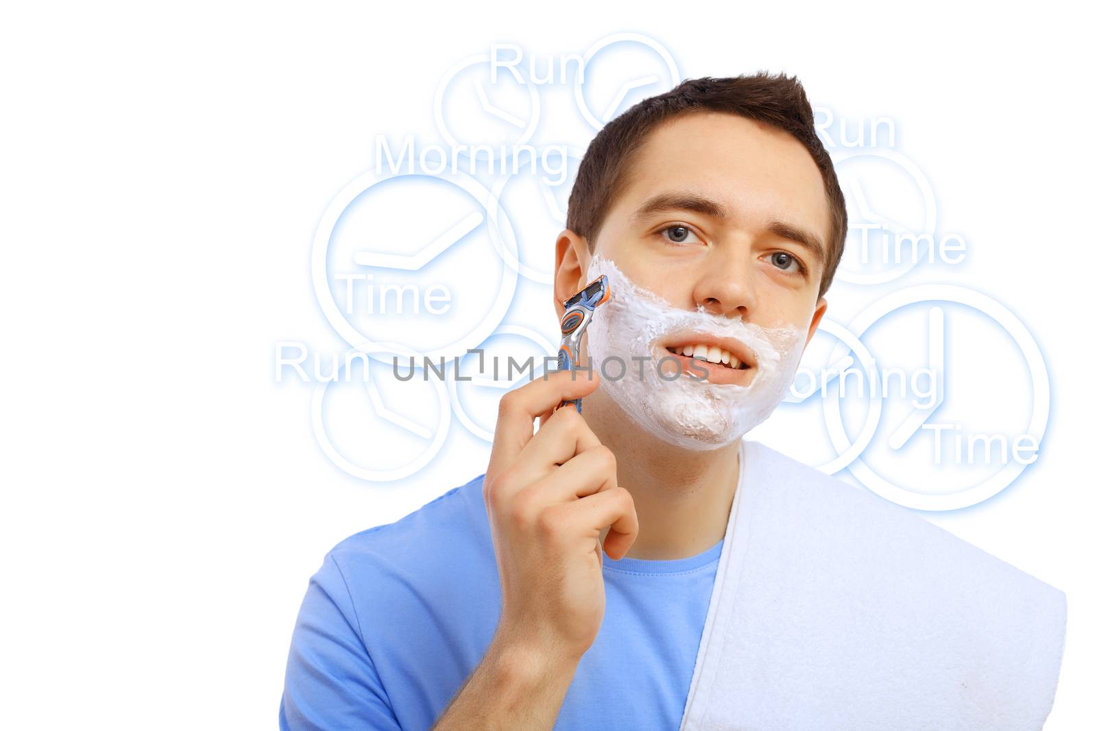 Young man in blue T-shirt shaving himself