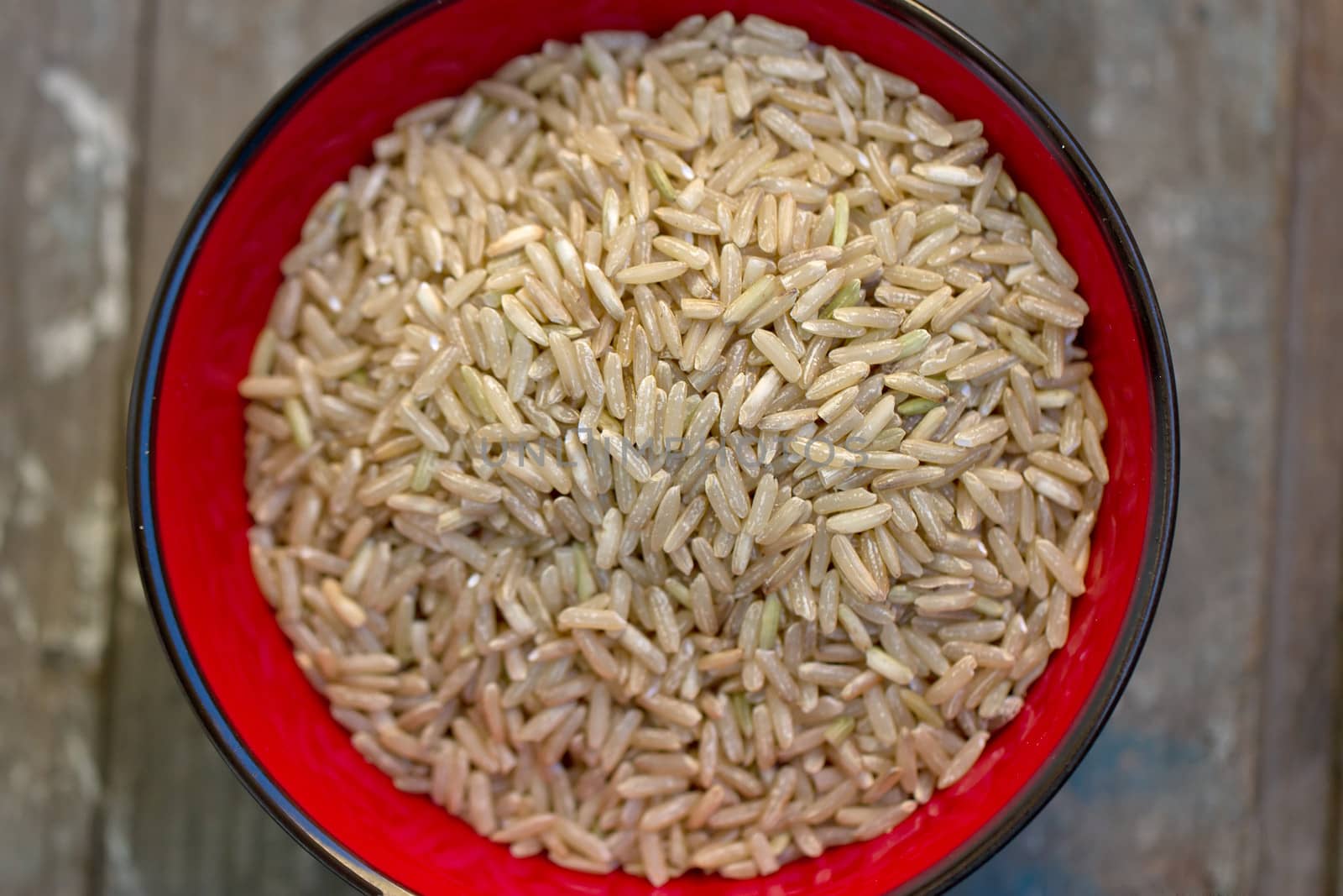 Raw brown rice in a bowl