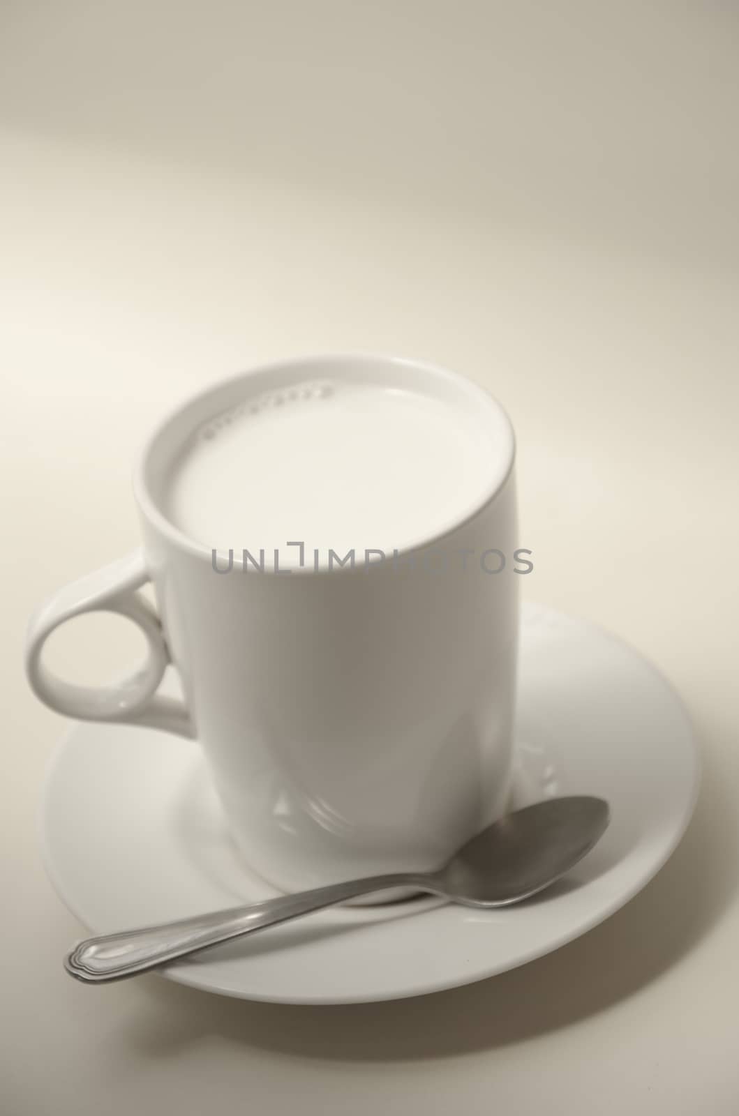Hot milk cup on table