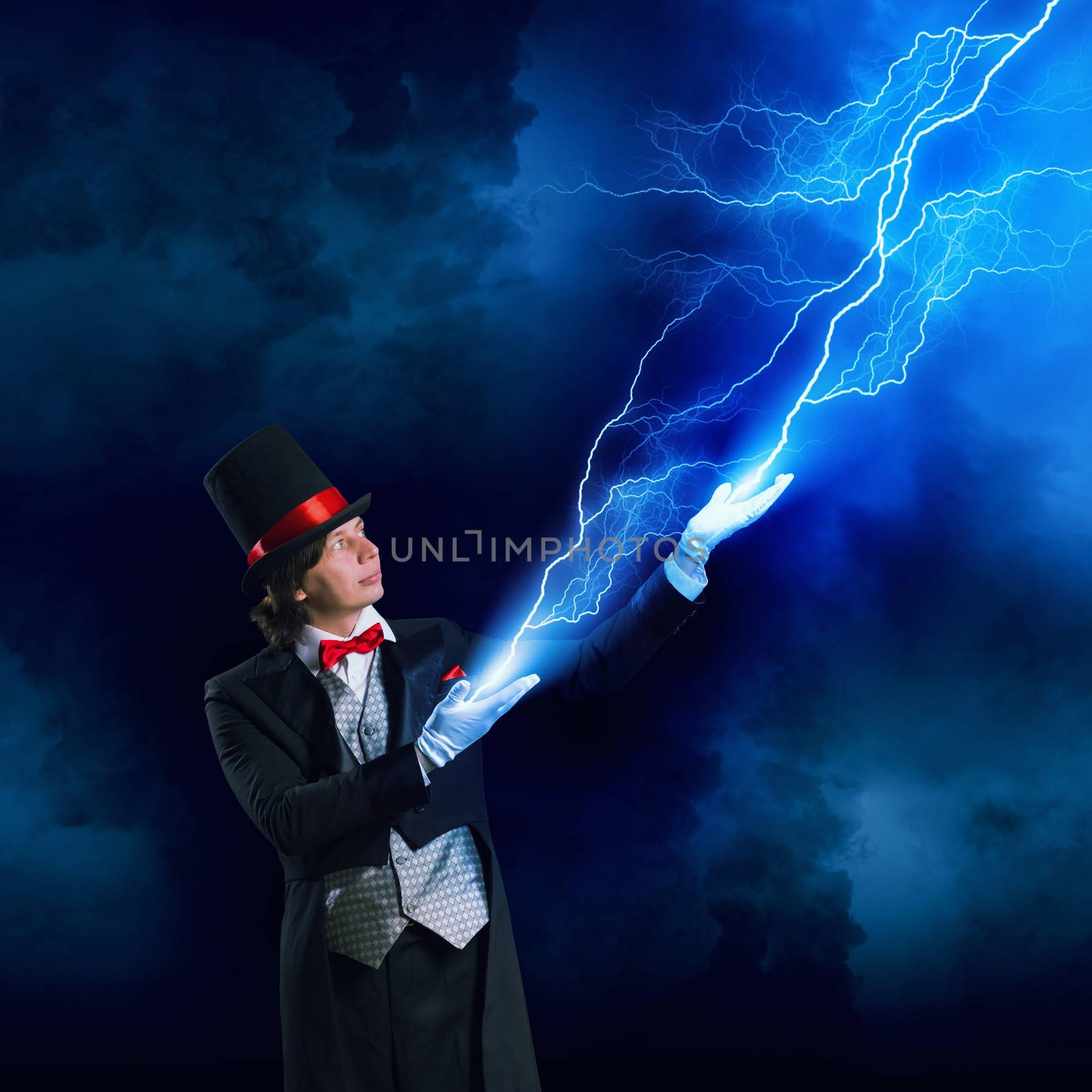 Image of wizard in red bow tie showing tricks