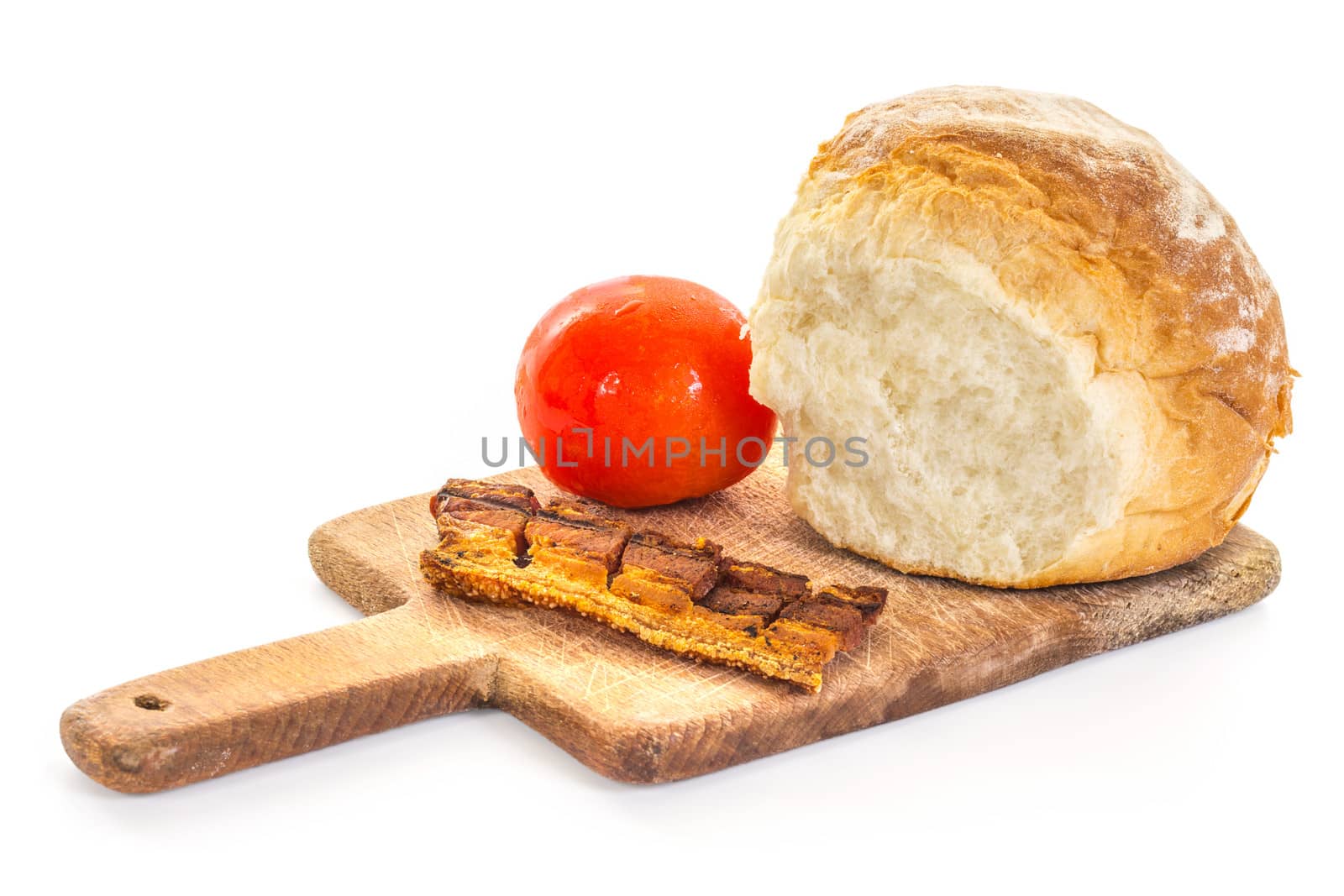 Grilled or Fried Bacon with Fresh Tomato and Bread Bun on the Cutting Board, high key