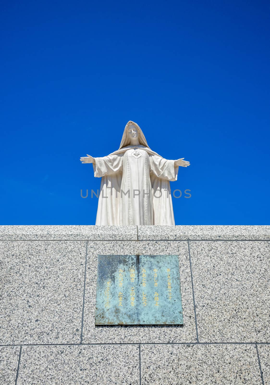 White Maria statue with blue sky2 by gjeerawut