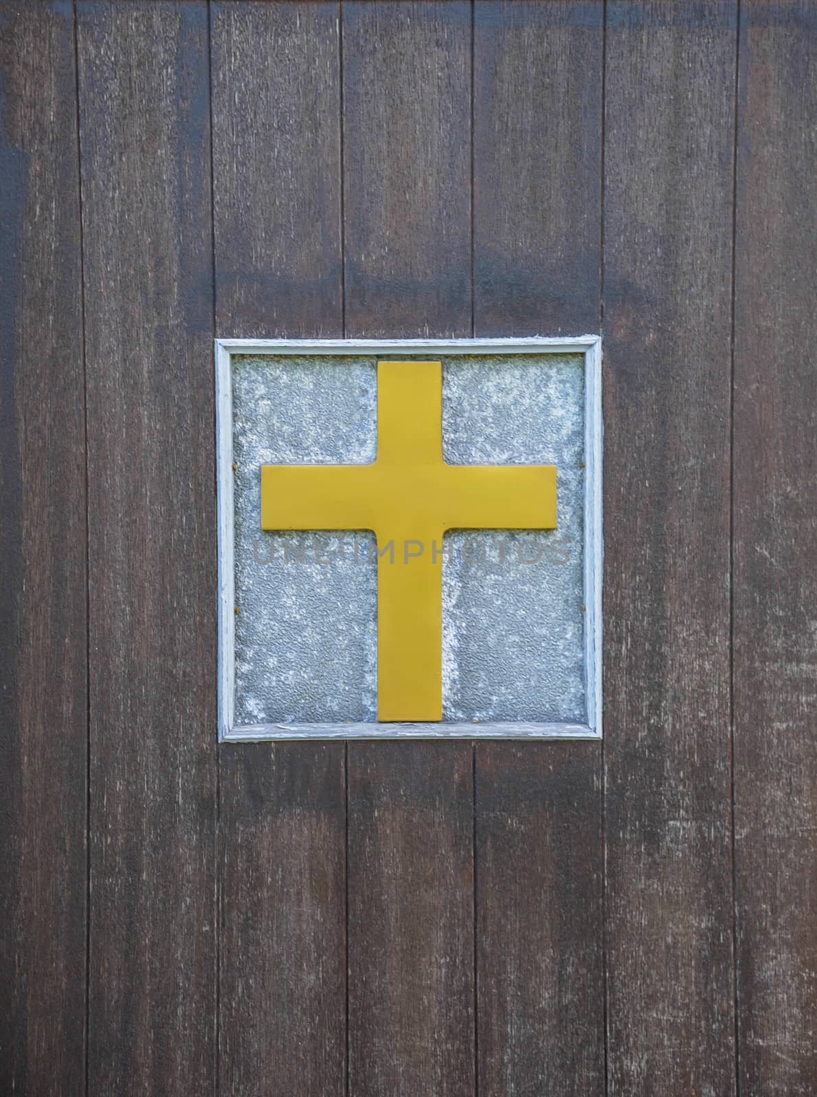 Cross on wooden door1 by gjeerawut