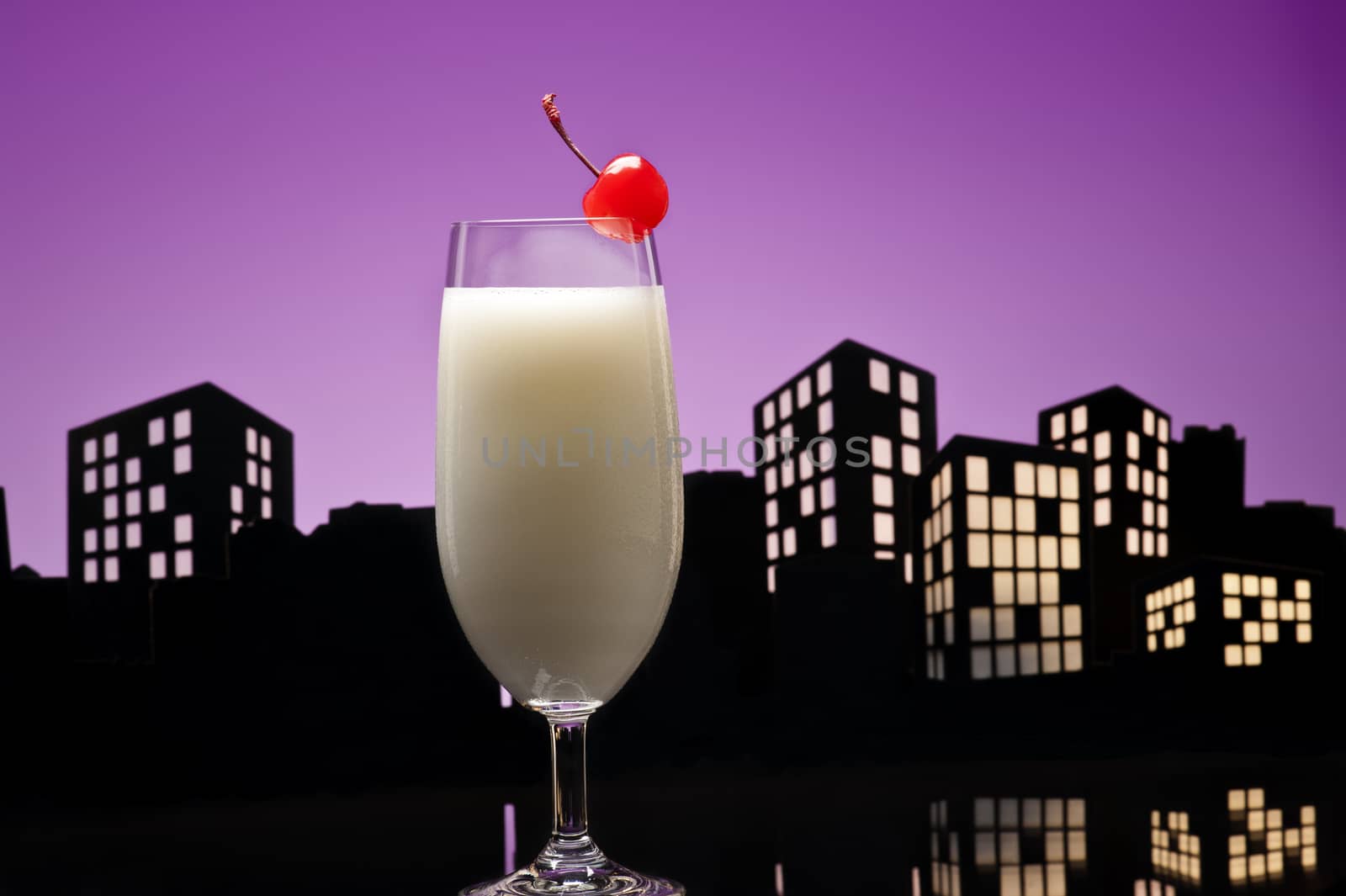 Metropolis Pina colada cocktail in city skyline setting