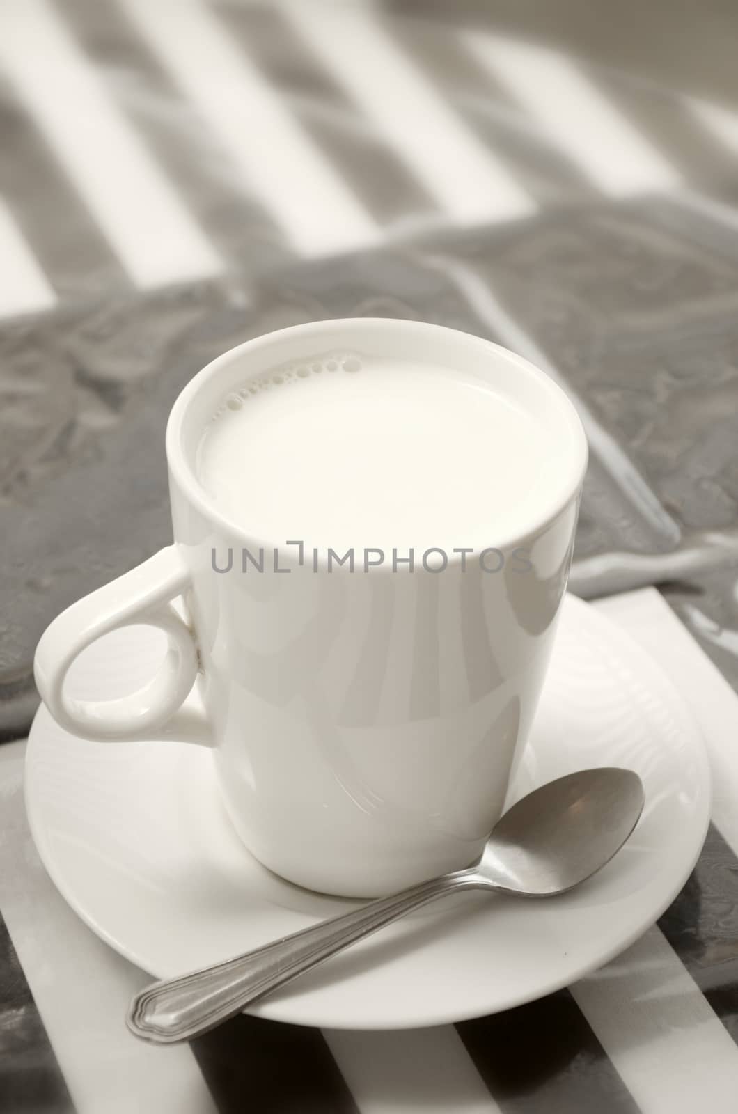 Hot milk cup on table