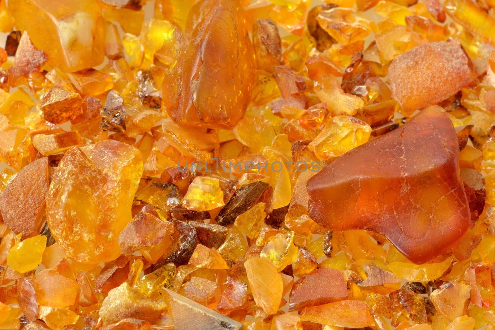 A bunch of different sized pieces of amber