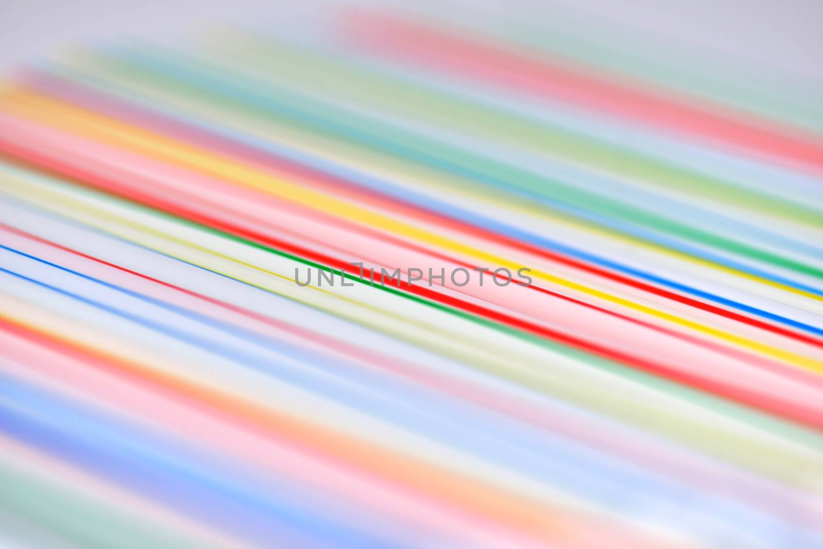 Many colorful drinking straws