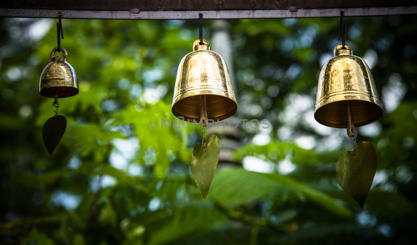 Three golden bells by gjeerawut