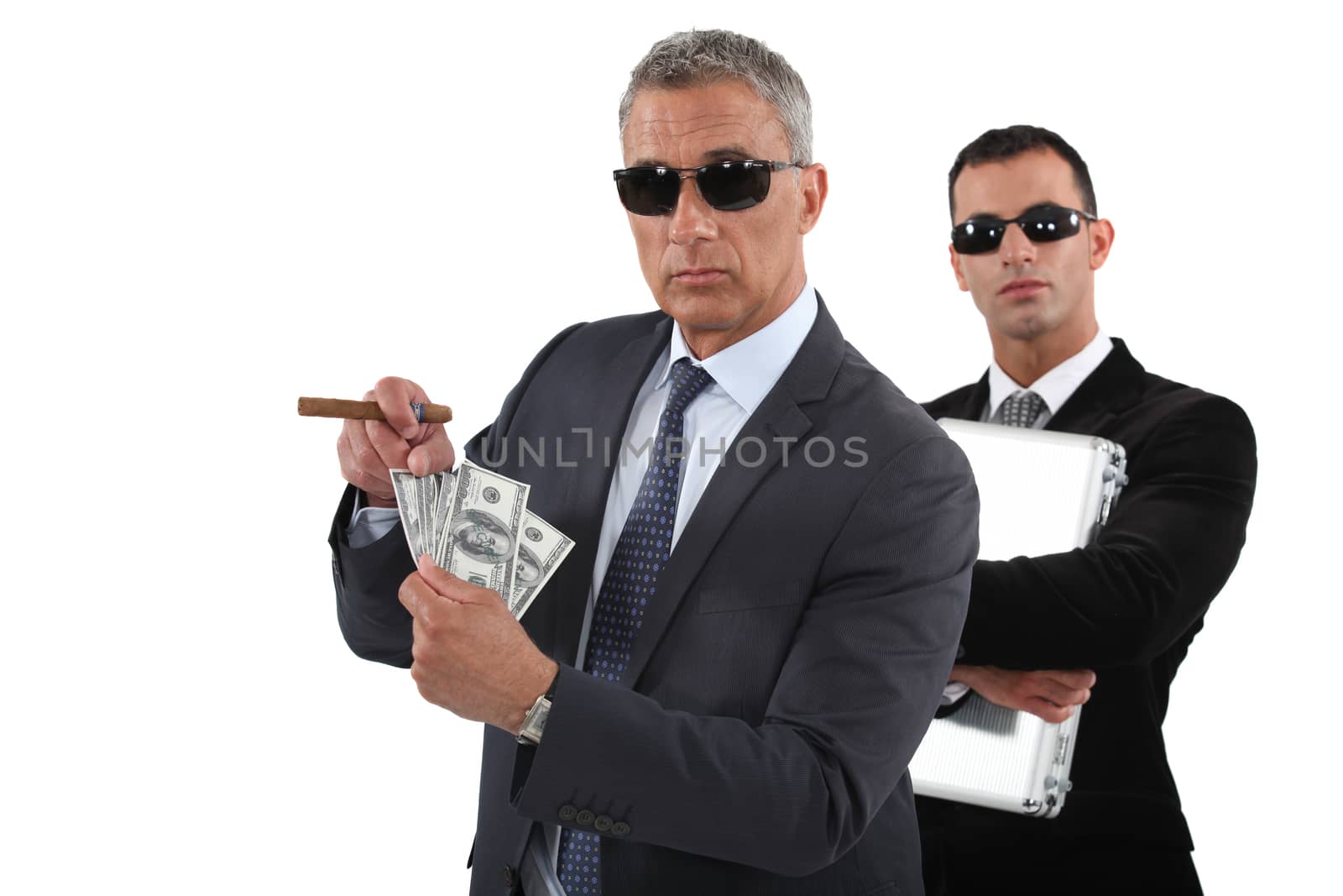Businessmen with cash