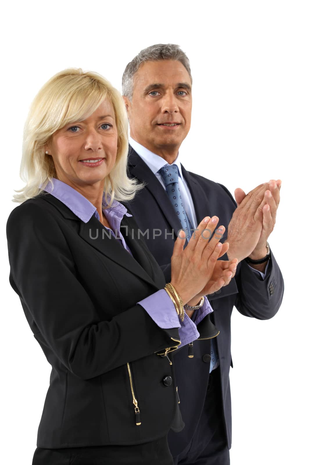 Business professionals clapping their hands
