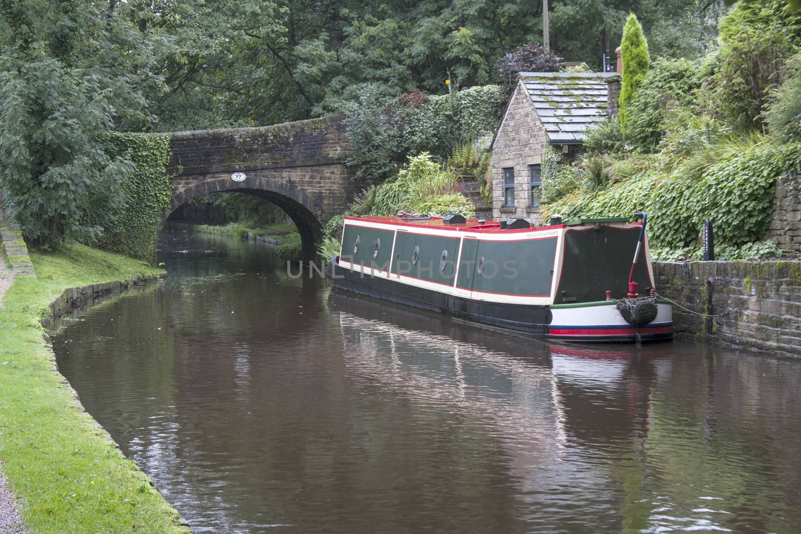 Barge moored on the Huddersfield Narrow Canal at Uppermill, Lancashire