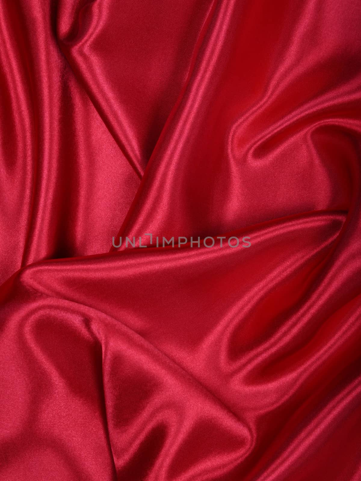 Smooth elegant red silk can use as background 