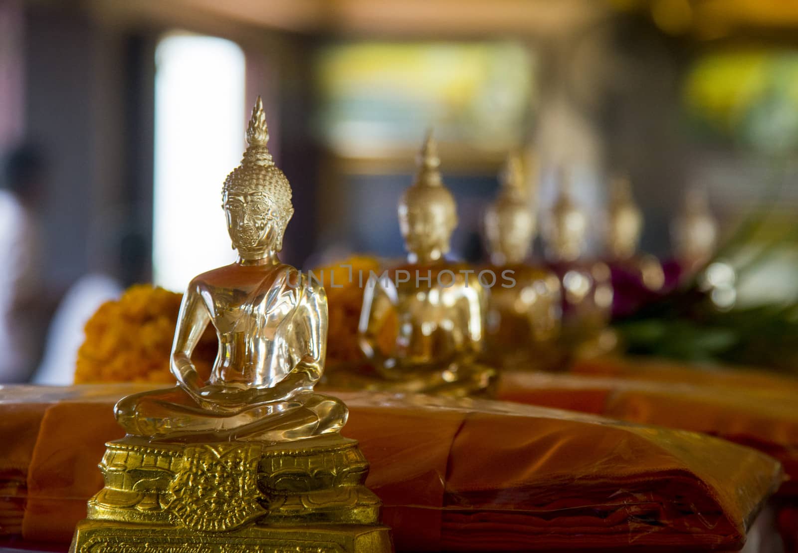 Row of glass image  buddha1 by gjeerawut