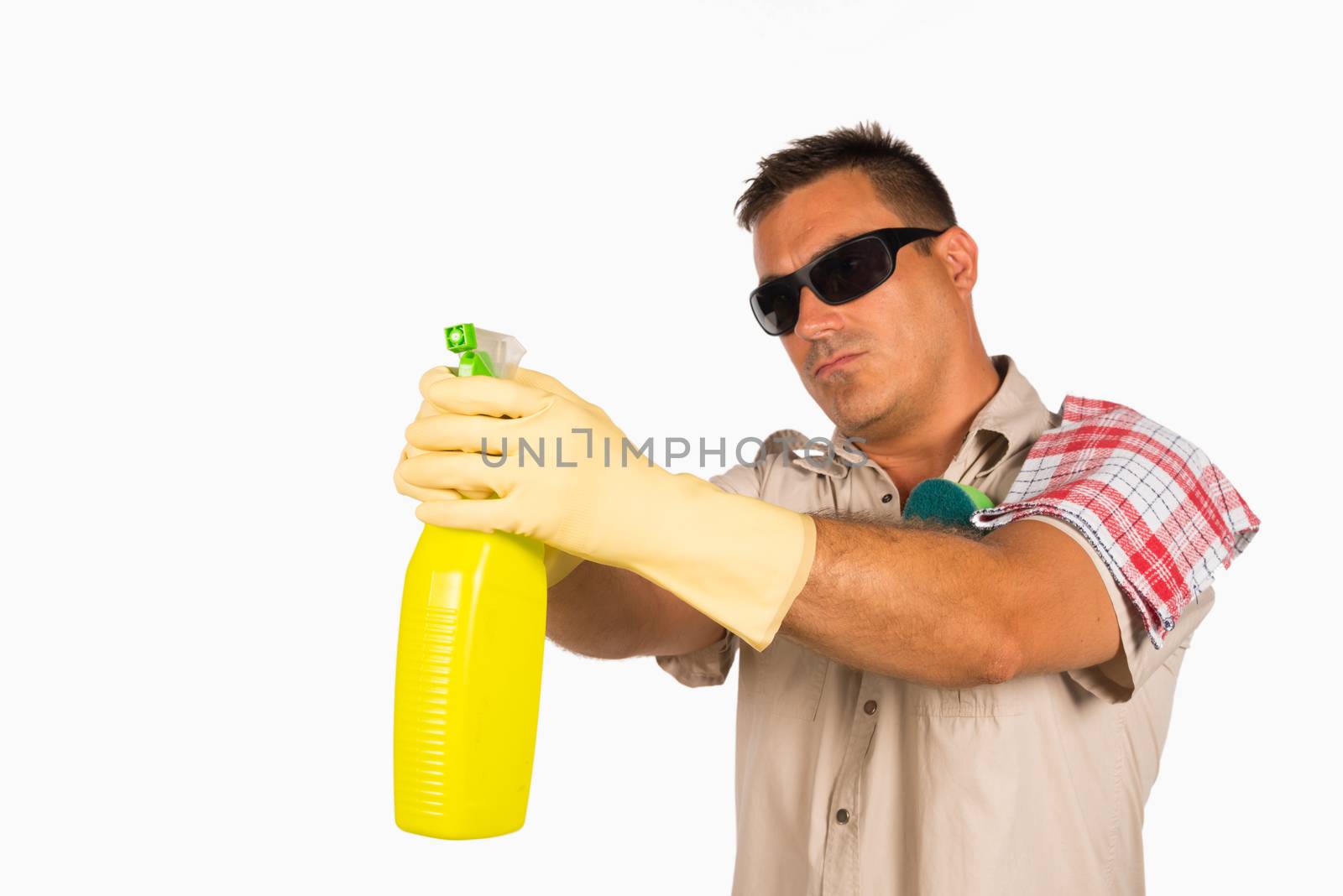 Latin man cleaning at home, the perfect househusband