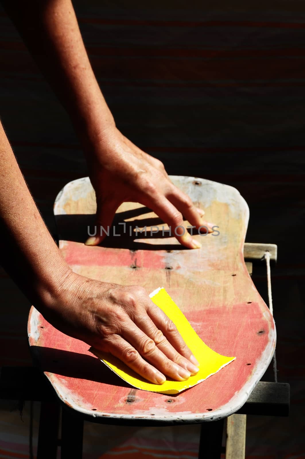 Restore an Old Skateboard with a Yellow Sandpaper