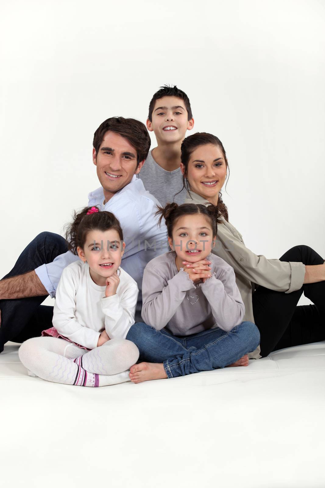 Family with three children by phovoir