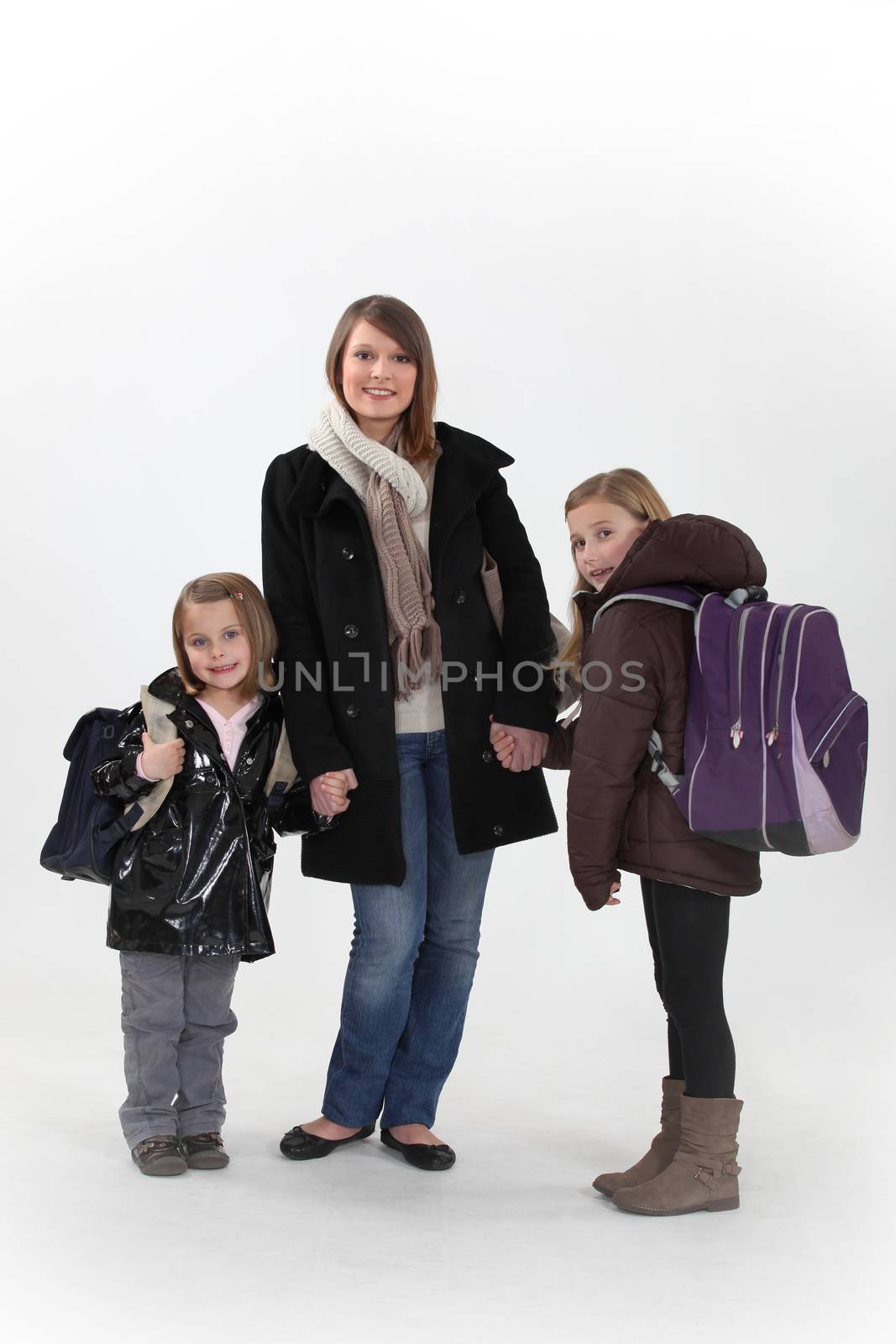 Girls with backpacks by phovoir